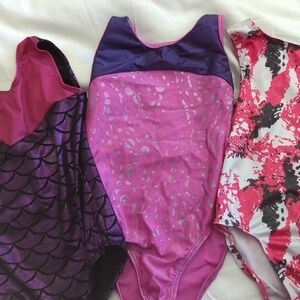 Set of Three Pink and Purple Leotards